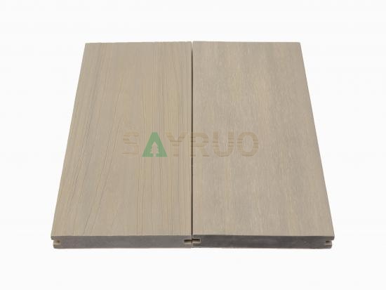Co-extrusion embossed woodgrain composite decking