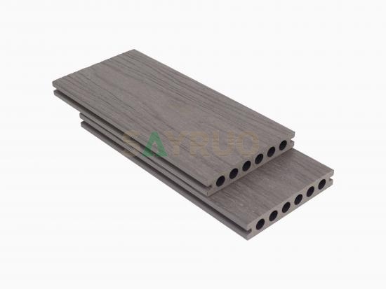 Co-extrusion embossed woodgrain composite decking