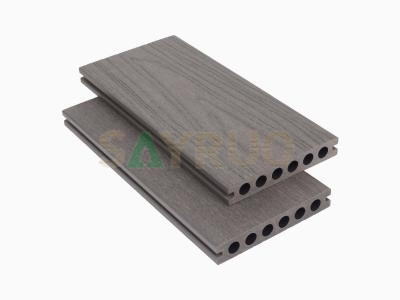 Co-extrusion embossed woodgrain composite decking